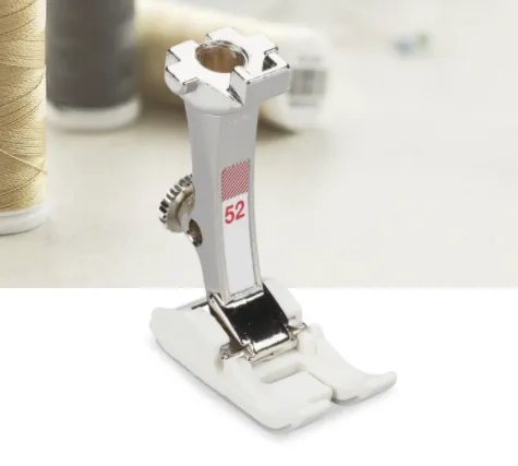 BERNINA Zigzag Foot with Non-Stick Sole #52 Can be used for various applications For all utility and decorative stitches Non-stick coating on the sole ensures it slides smoothly For plastic, vinyl, leather, etc. For 5.5 mm and 9 mm machines